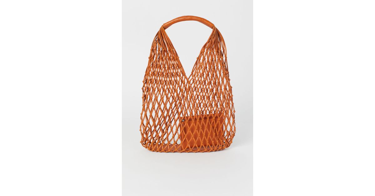H M Netztasche aus Leder in Orange Lyst DE