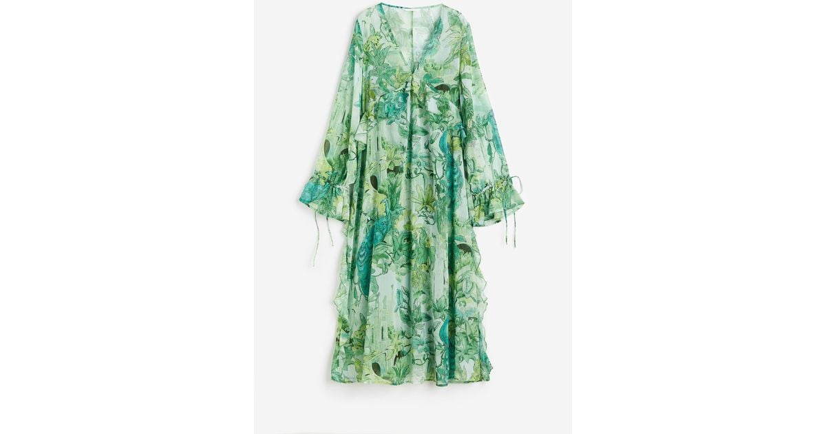 Longue robe volantée H&M en coloris Vert | Lyst