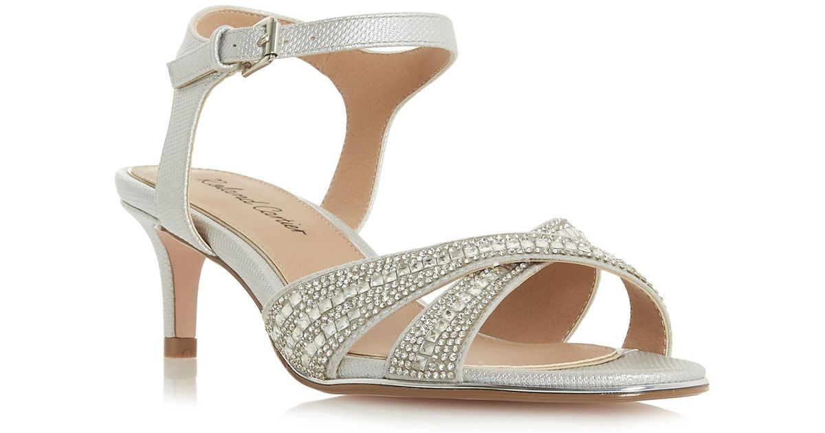 roland cartier silver heels