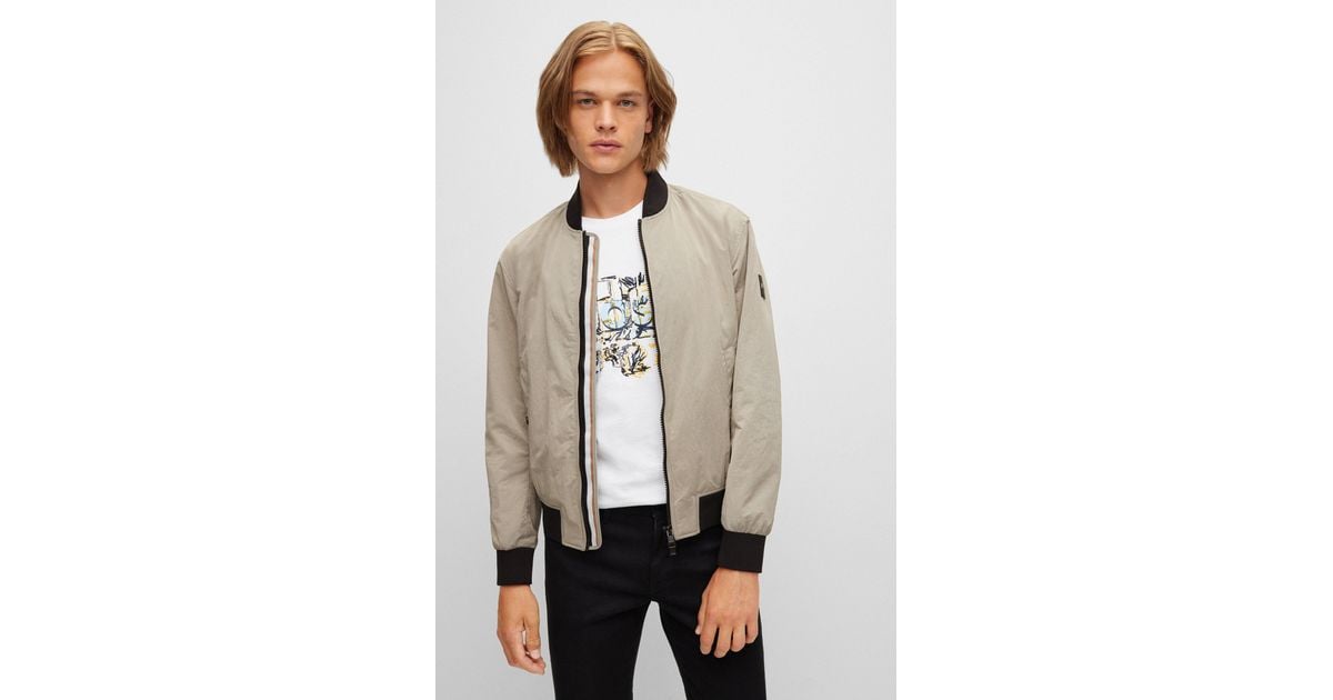 BOSS - Regular-fit bomber jacket in tiger-pattern velvet