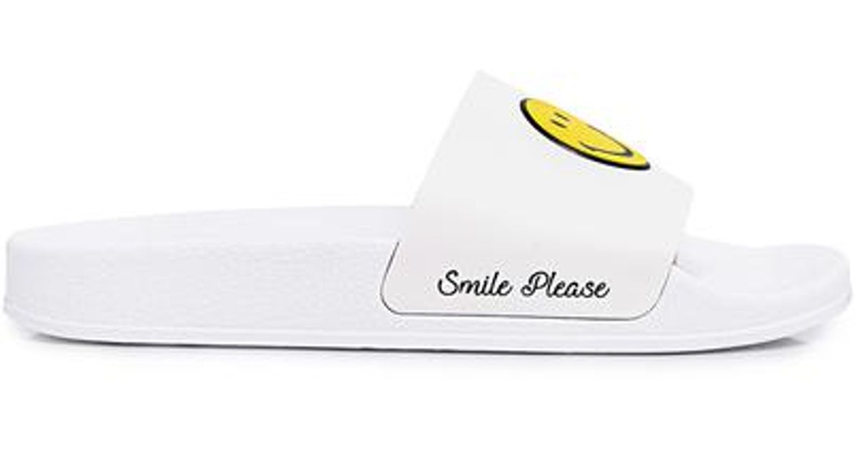smiley nike slides