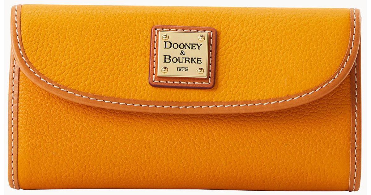 Dooney & Bourke Continental Clutch in Orange Lyst