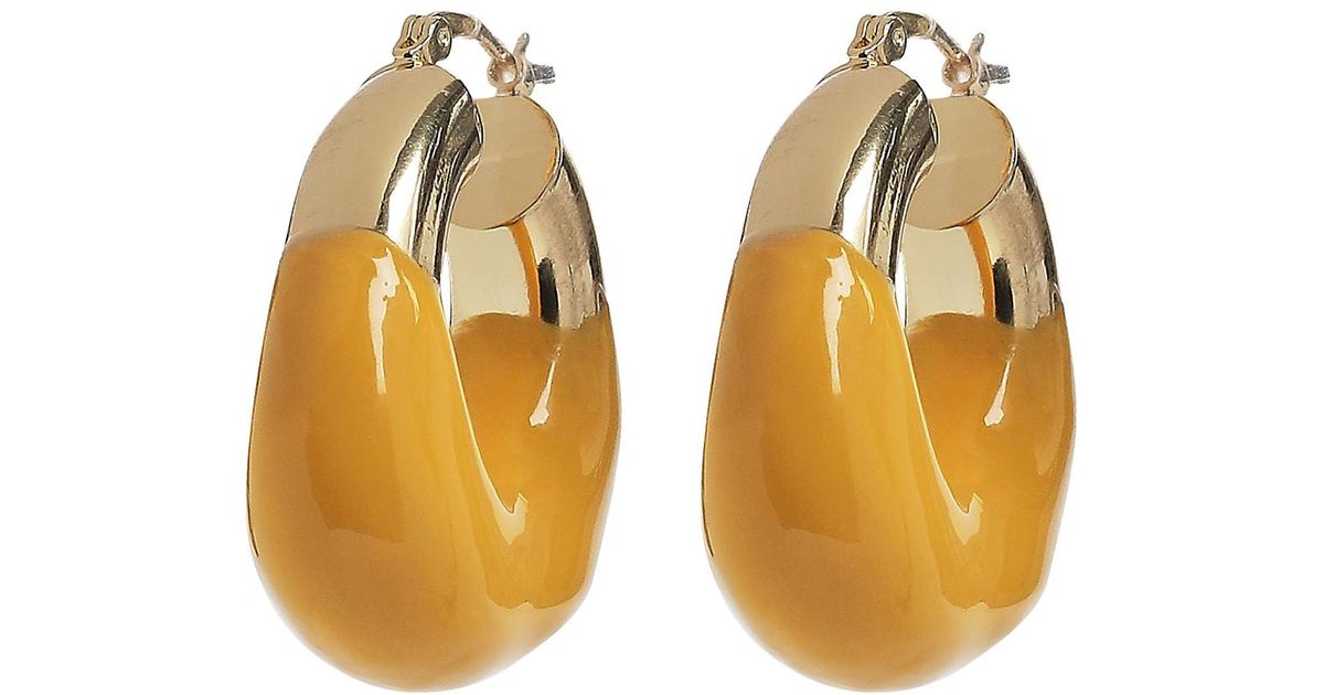 Eliou Claret Hoop Earrings in Yellow | Lyst