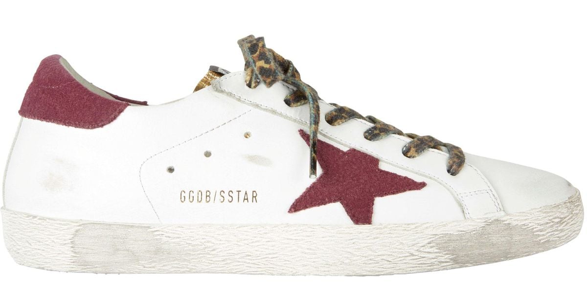 golden goose with red star