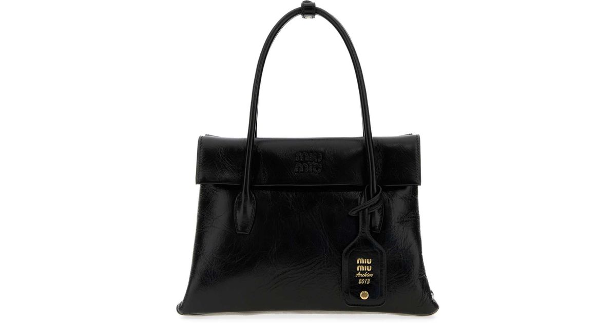Miu Miu Handbags in Black | Lyst