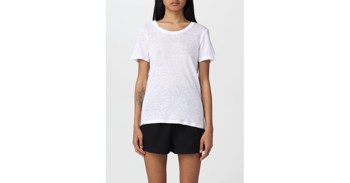 white linen pants and top