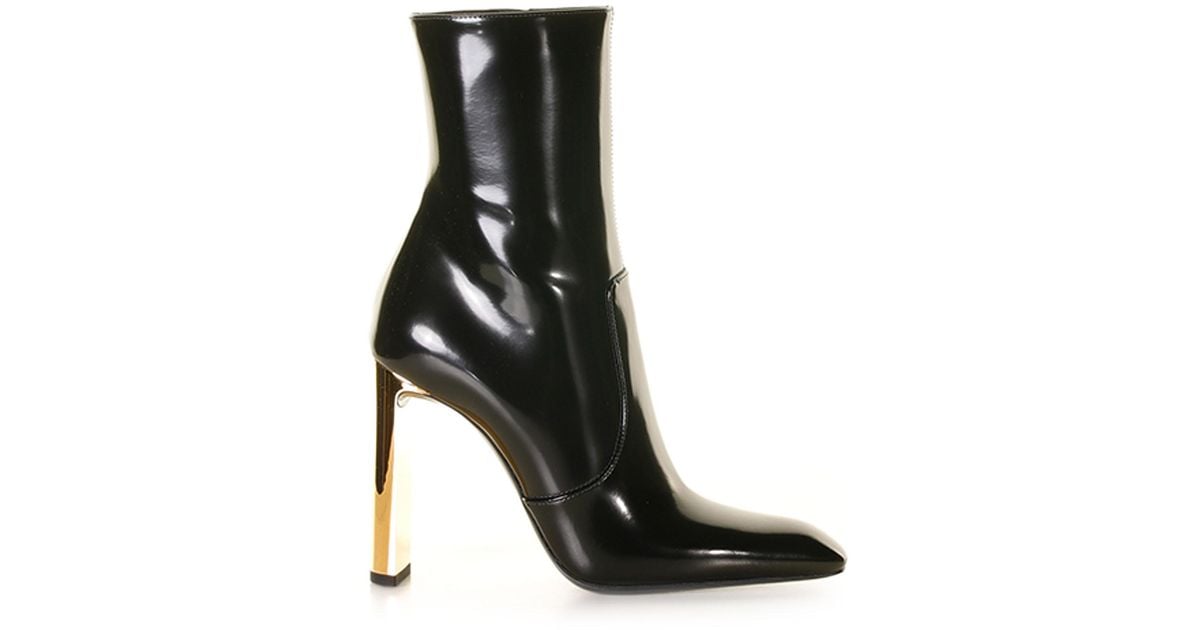 Black bootie with gold heel hotsell