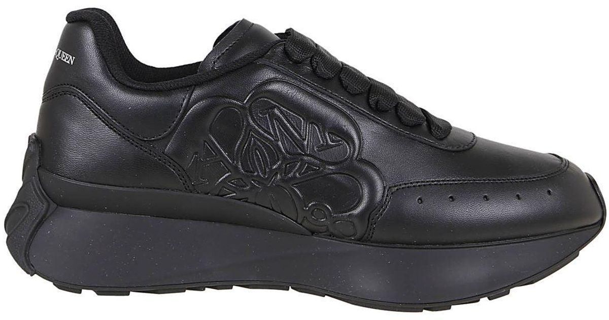 Alexander McQueen Leather Logo Embossed Lace-up Sneakers in Black - Lyst
