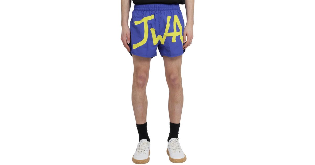 JW Anderson Blue Logo Swimshorts for Men - Save 7% | Lyst