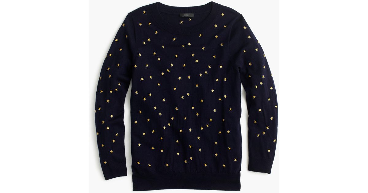 navy sweater with gold stars