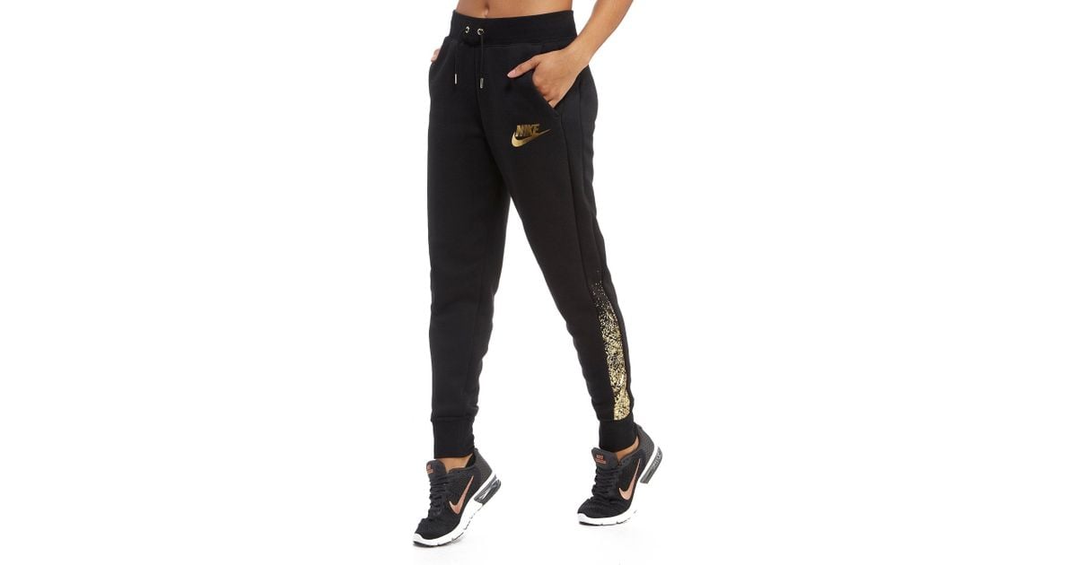 Nike Metallic Fleece Pants in Black - Lyst