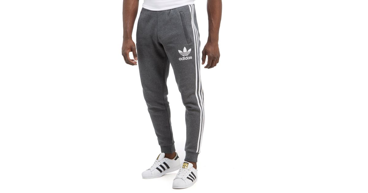 dark grey adidas track pants