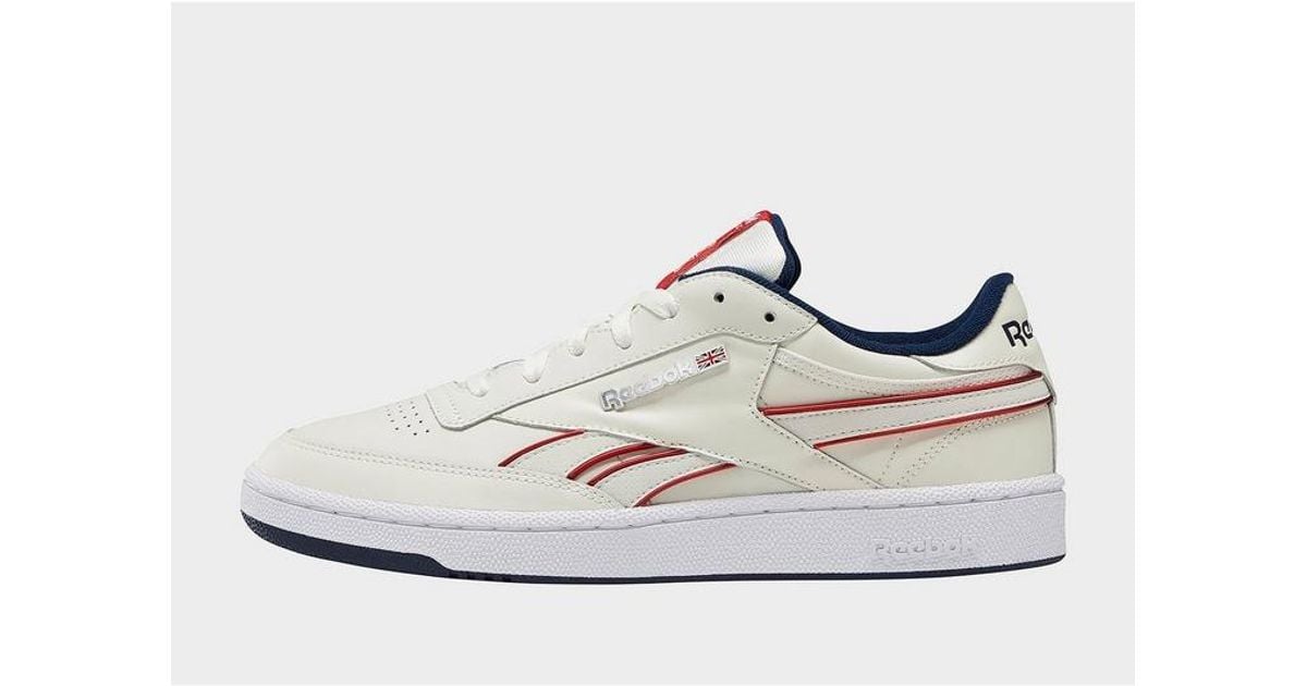 reebok classic revenge plus sneakers in white and navy