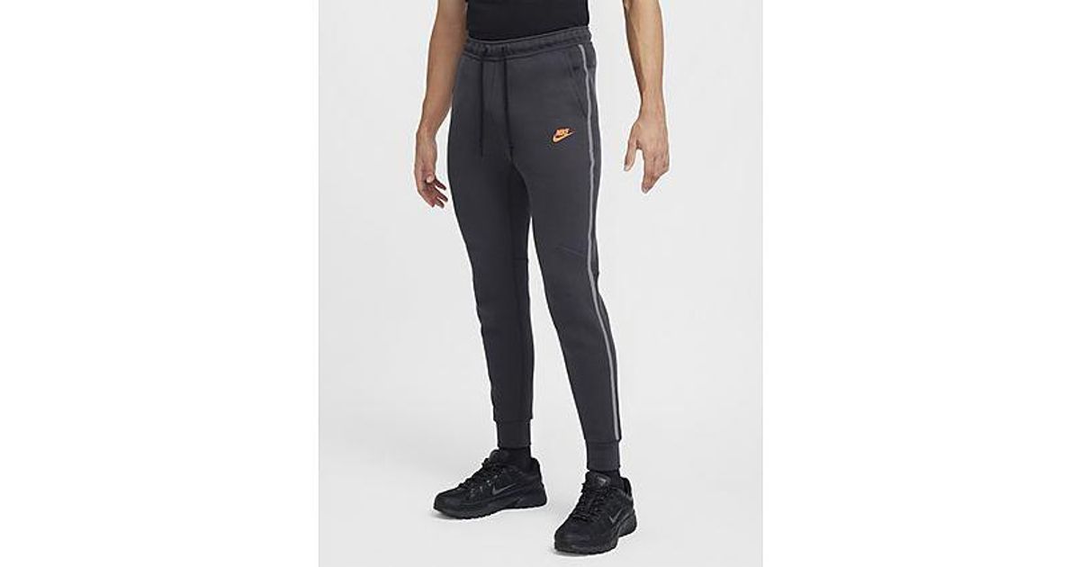 Nike sweatpants reflective sale