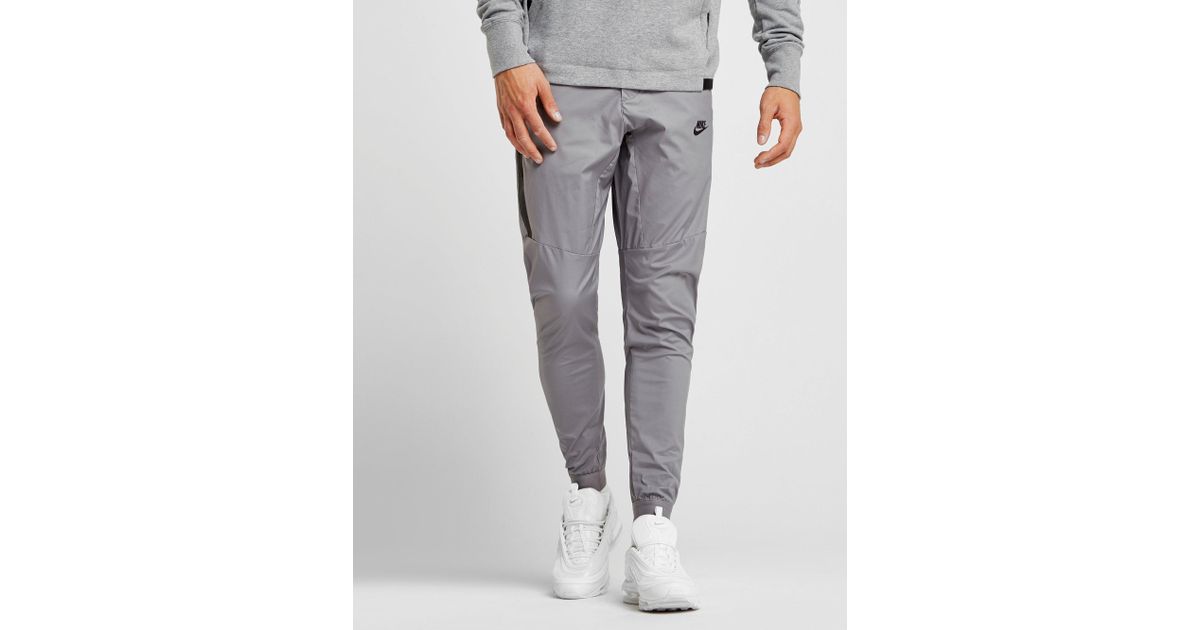 nike tech bonded woven pants