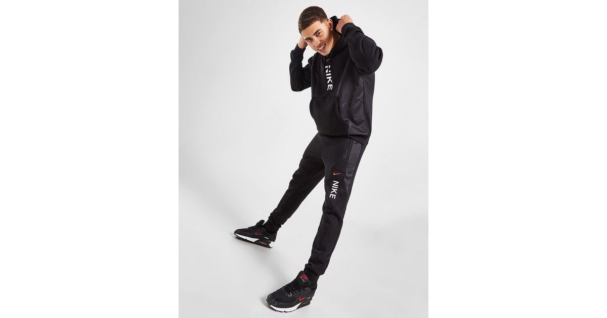 Nike hybrid sweatpants in black sale