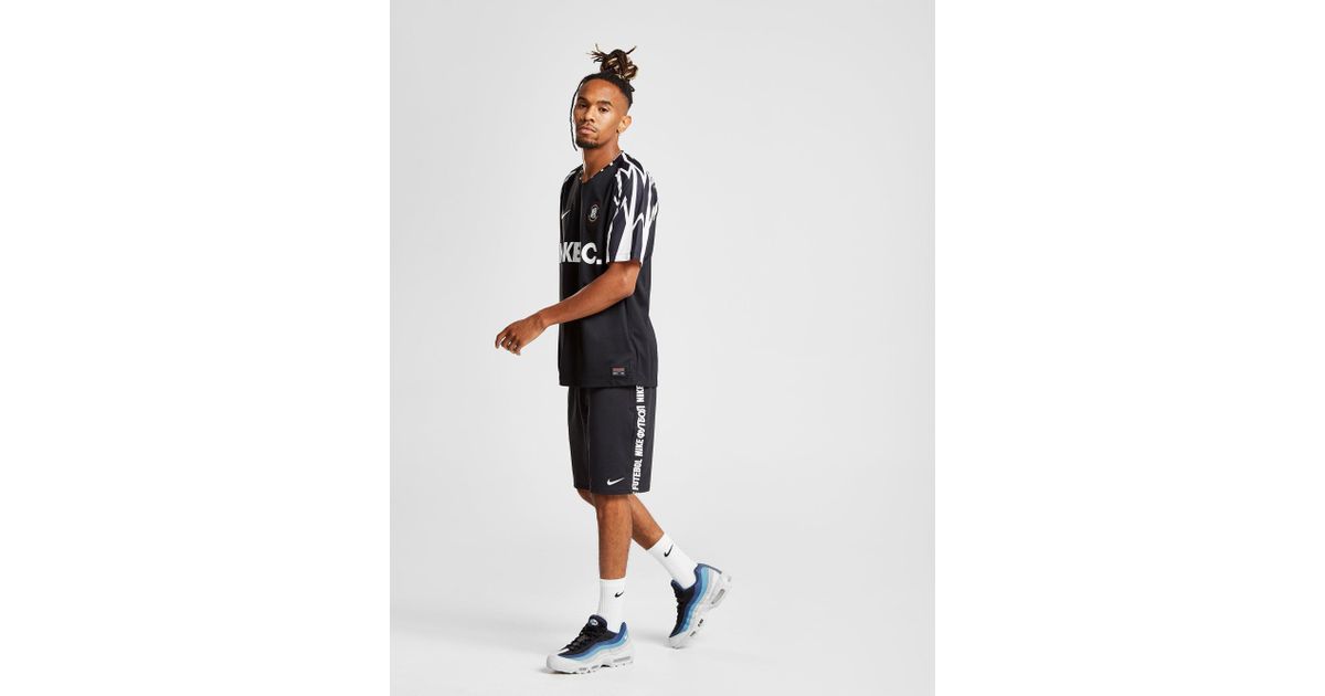 nike tape shorts