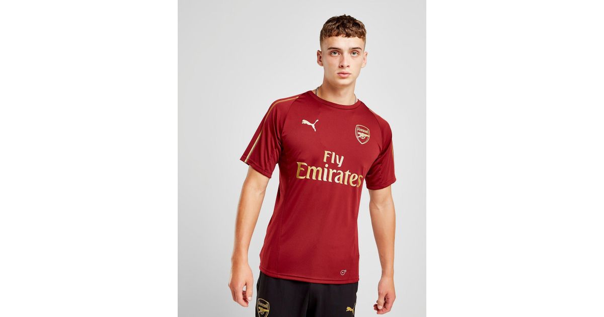 burgundy and gold puma shirt