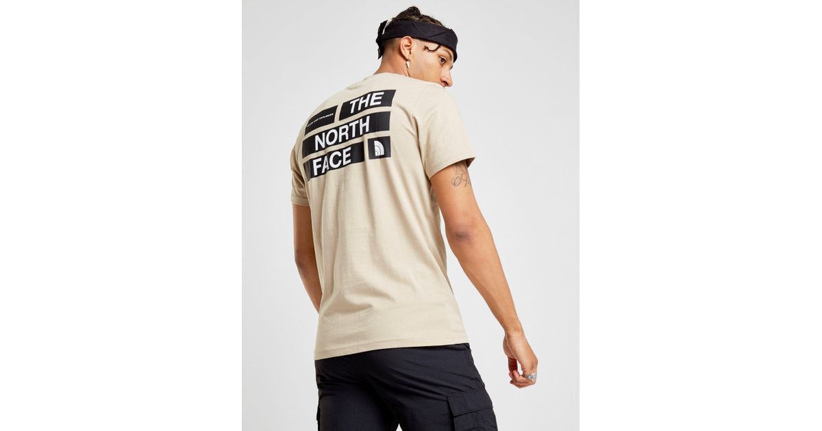 beige north face t shirt