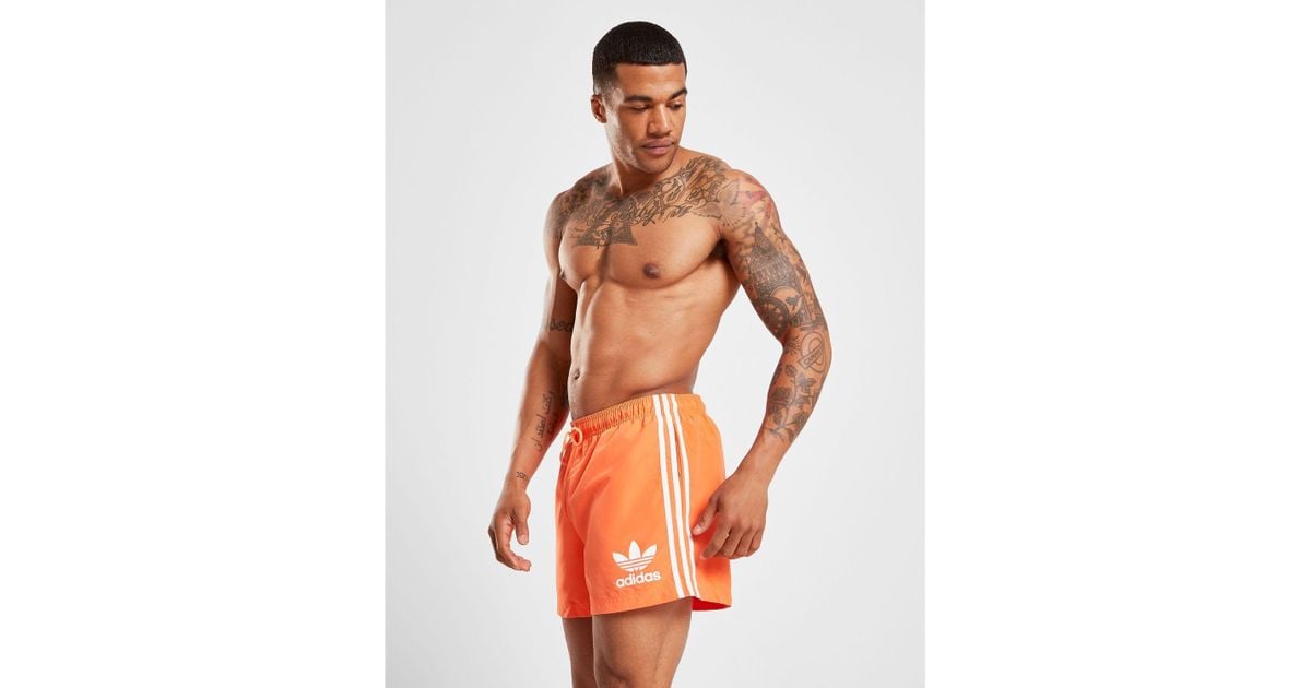 adidas swim shorts orange
