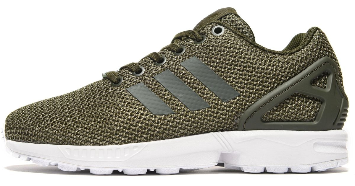 green adidas flux trainers