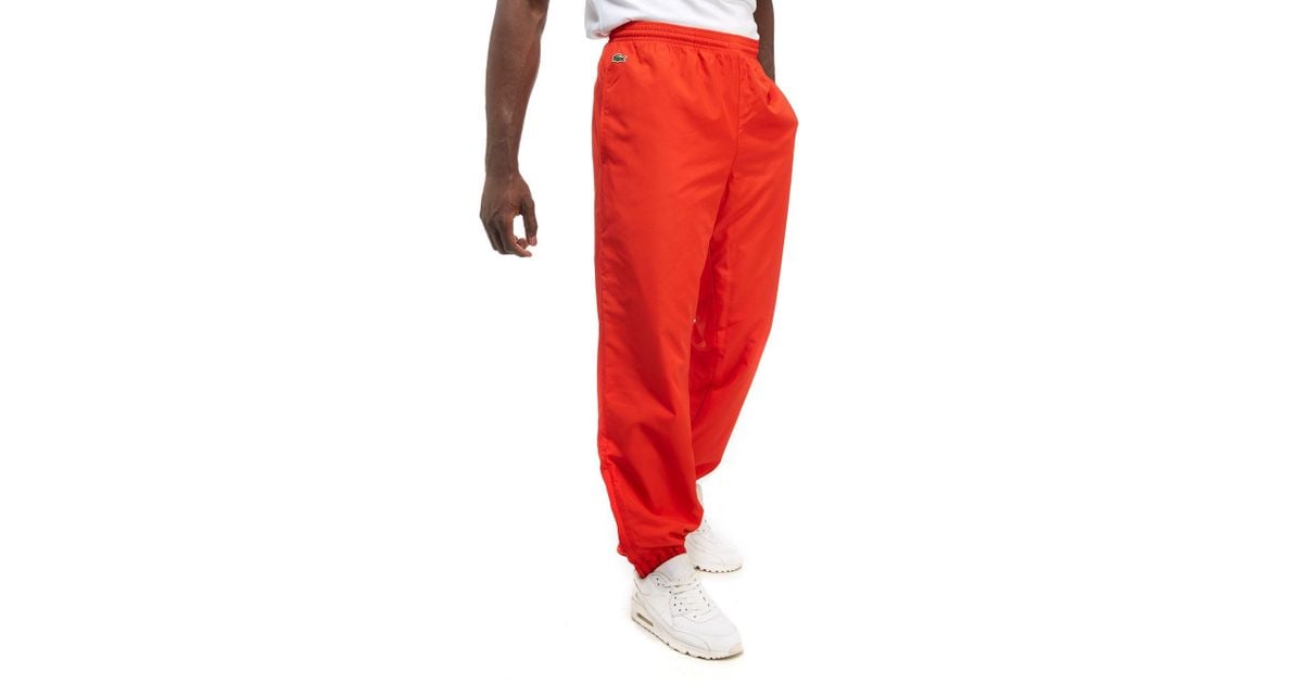 red lacoste bottoms