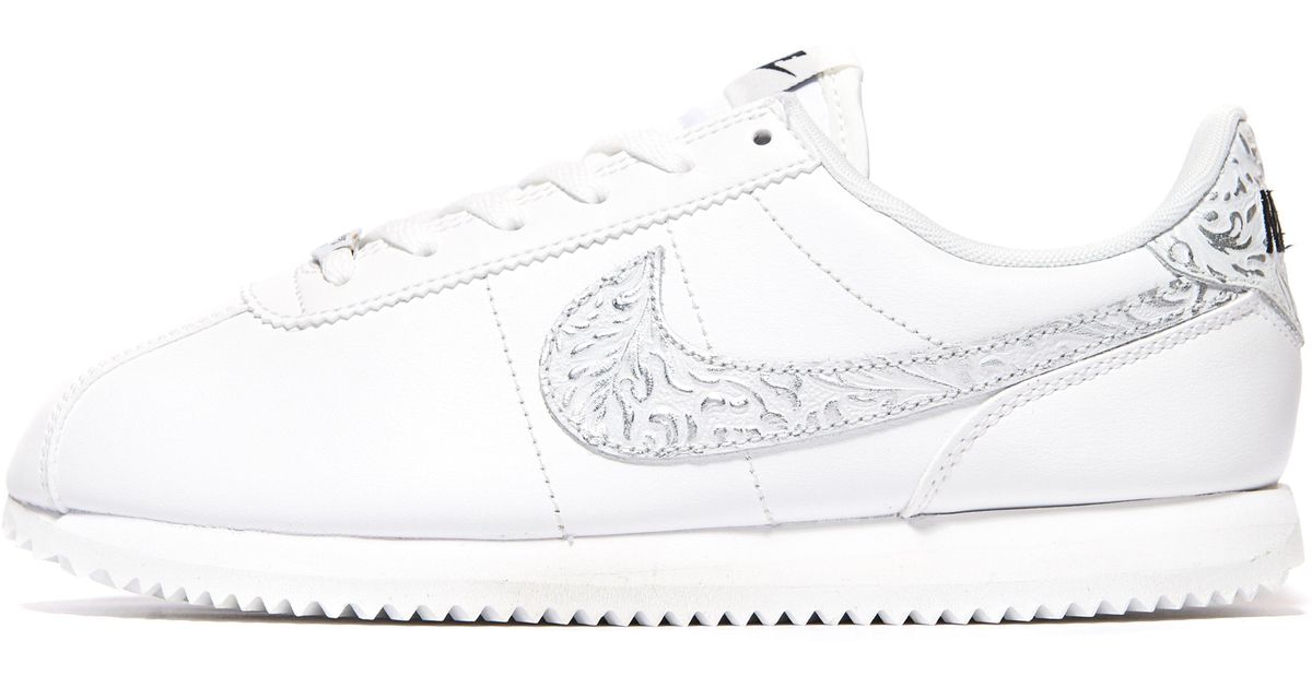 all white nike cortez junior