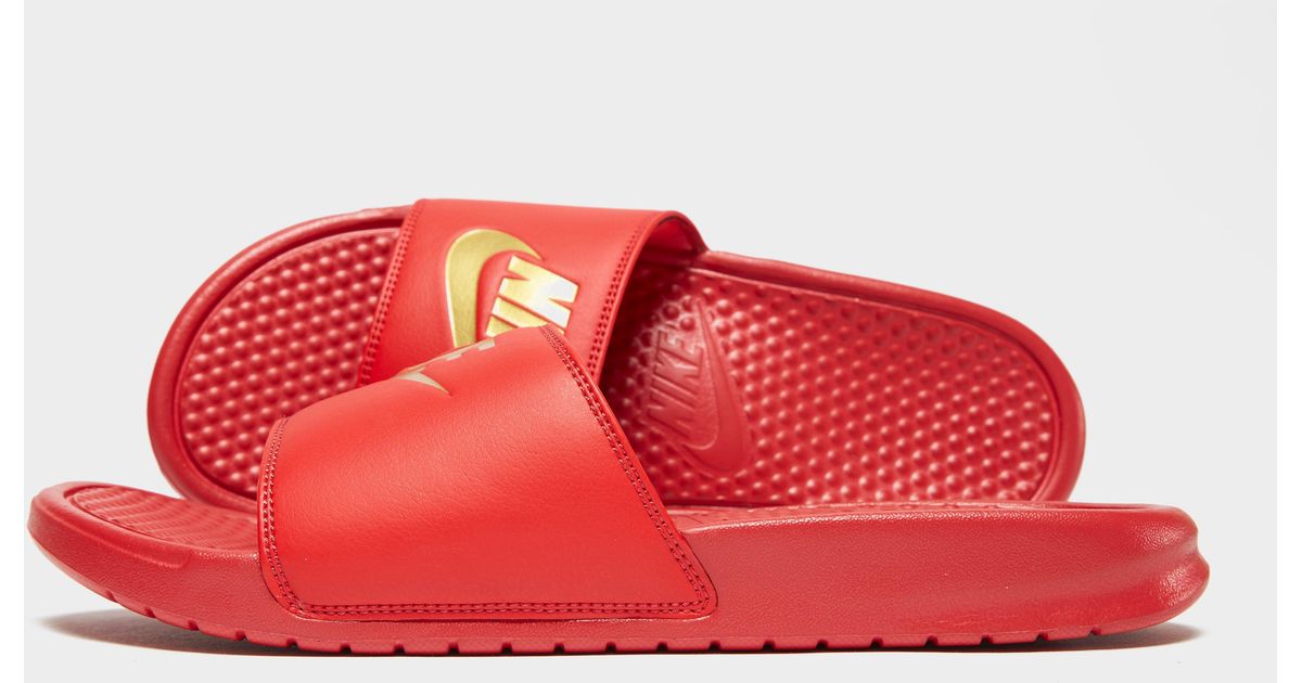 nike red and gold slides
