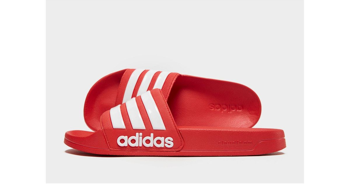 all red adidas slides