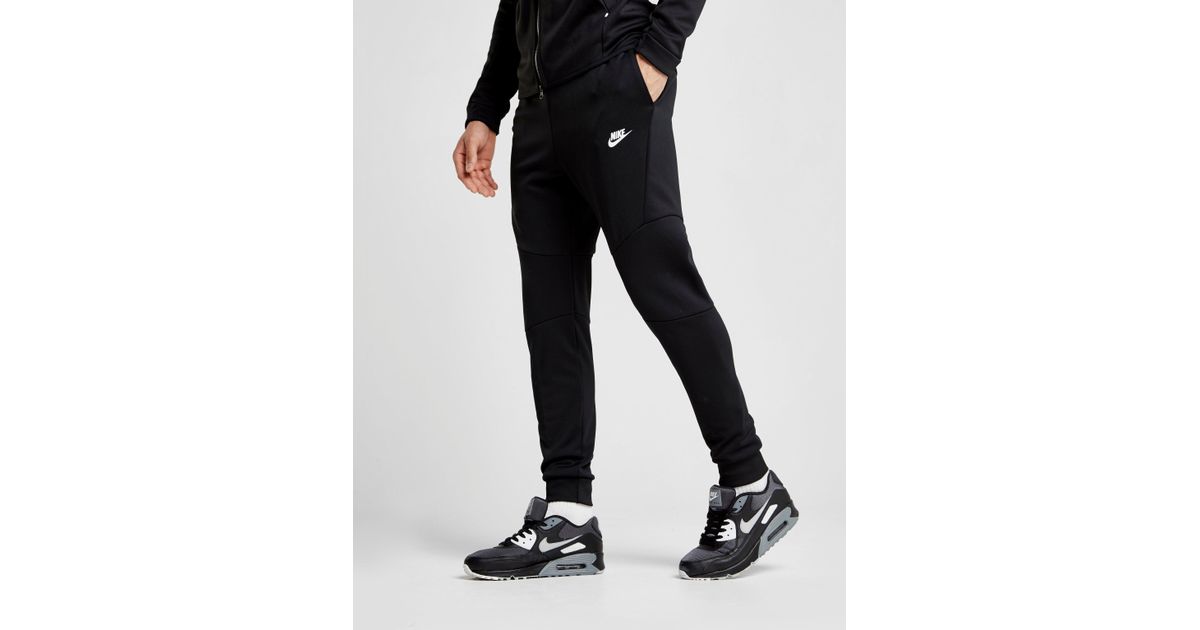 nike tech poly track pants
