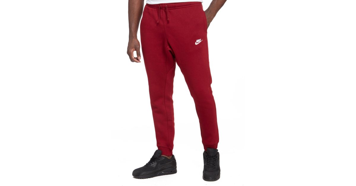 red nike fleece pants