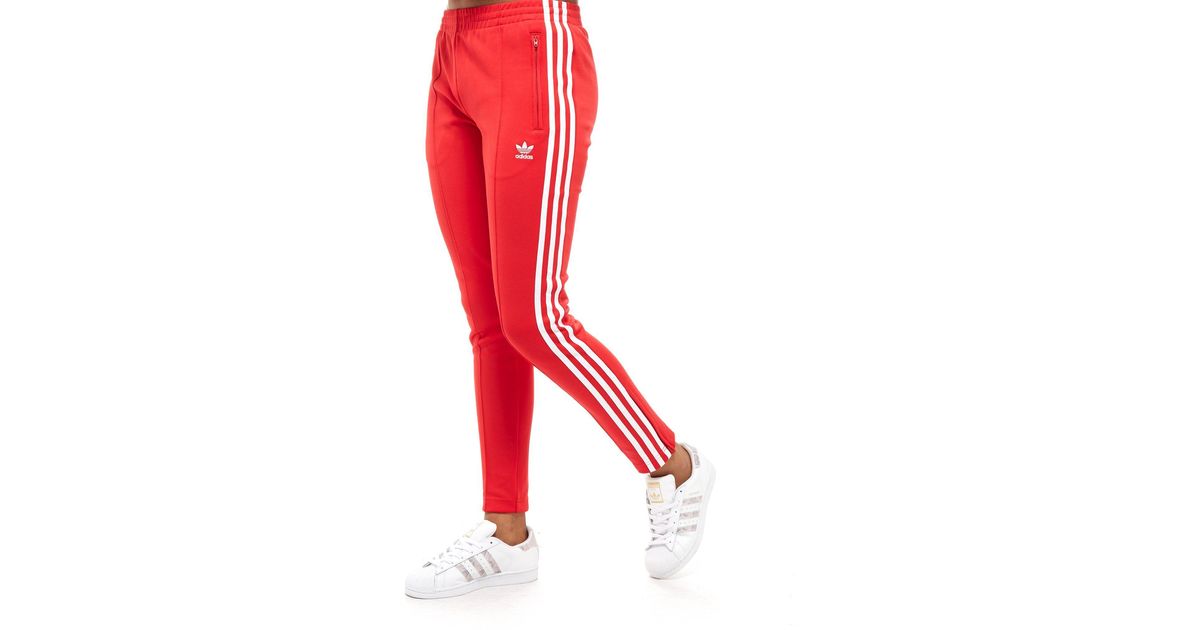 adidas superstar track pants red
