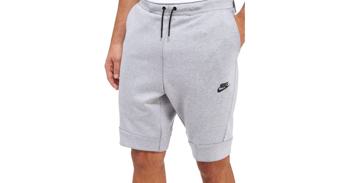 white nike tech shorts
