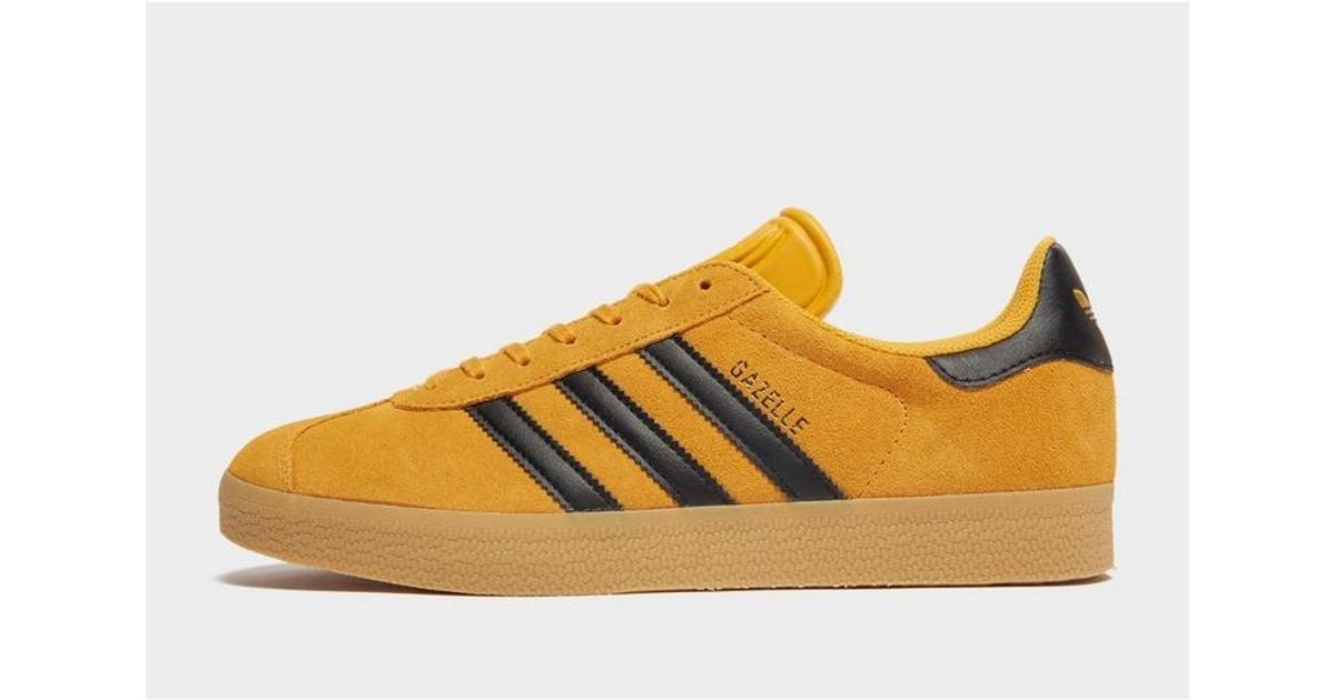 adidas yellow black gazelle