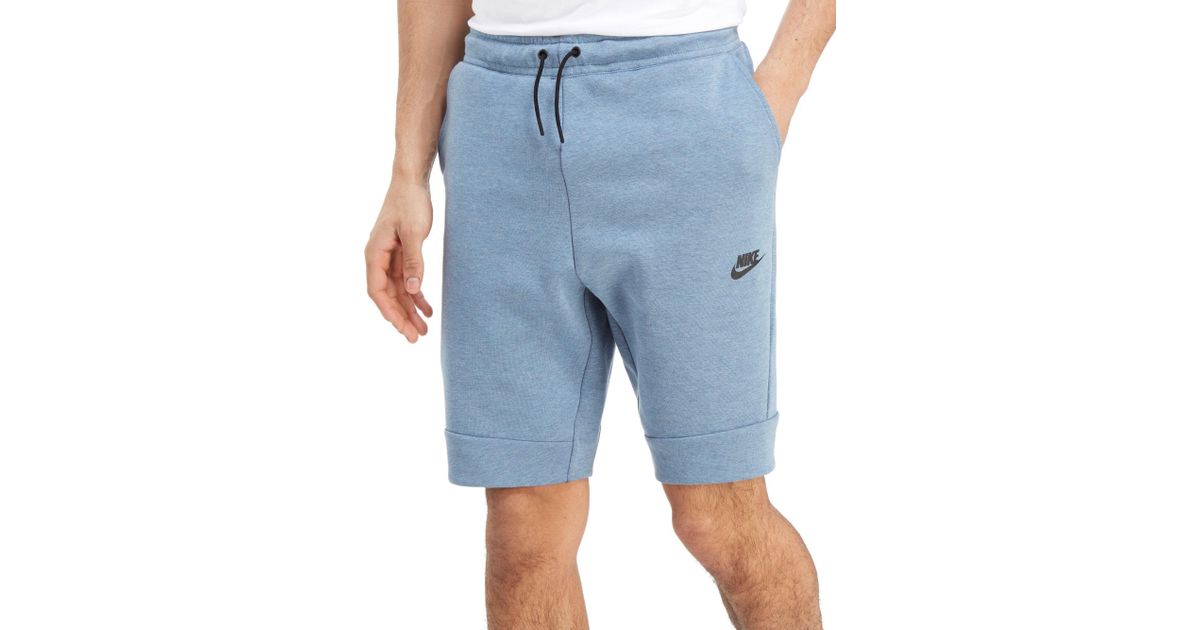 blue nike tech shorts