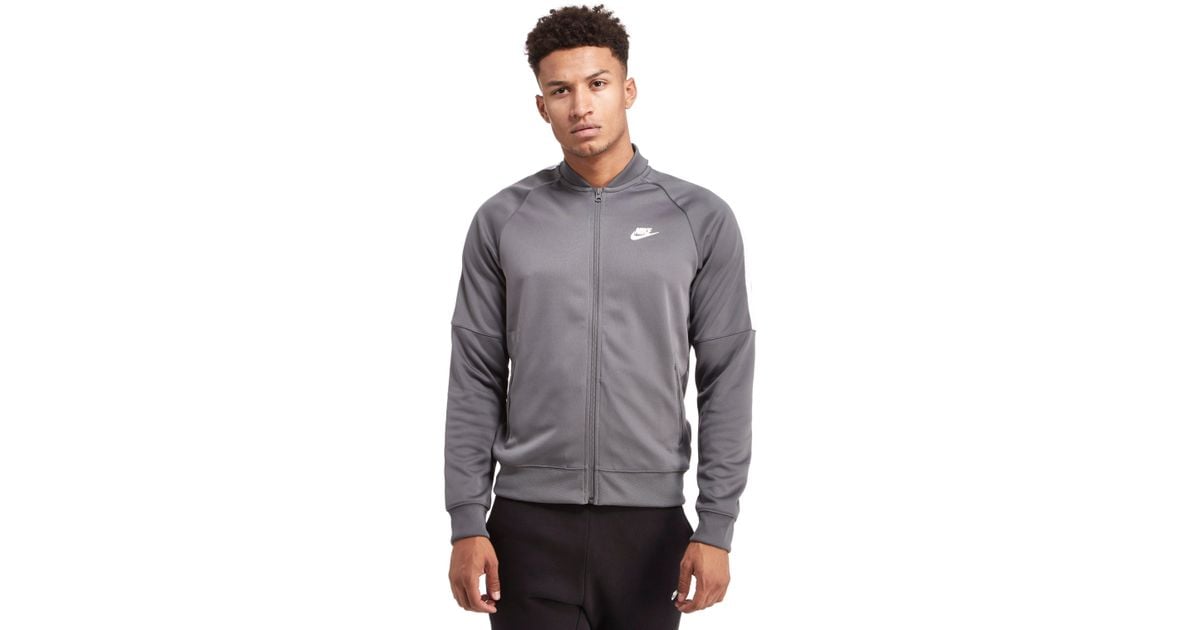 grey nike track top