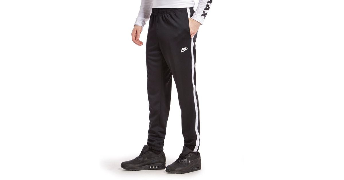 nike tribute pants black