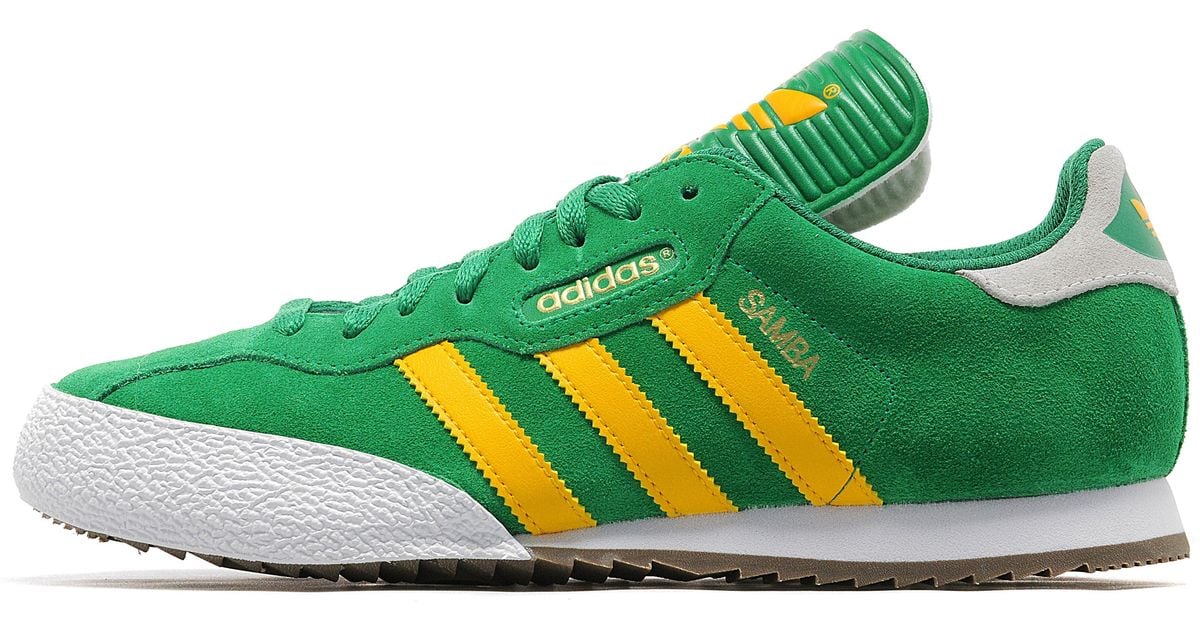 green adidas samba trainers