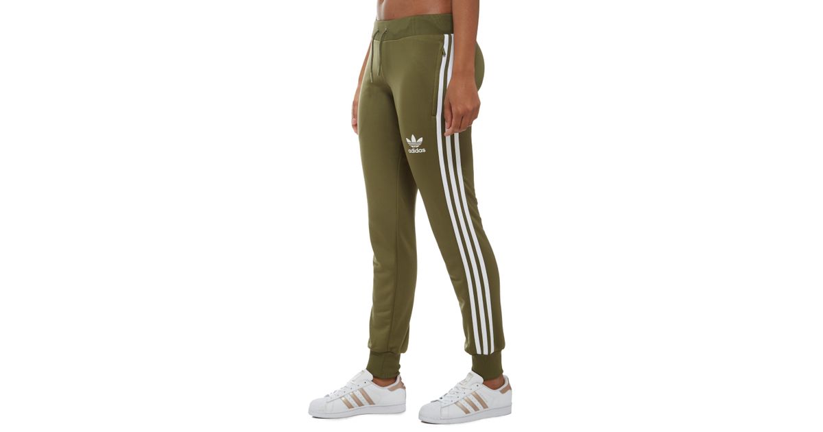 green with red stripe track pants