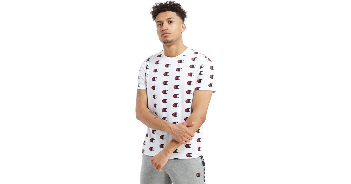 champion all over logo shirt