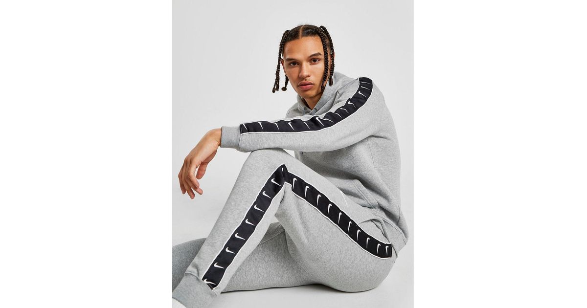 nike grey tape tracksuit