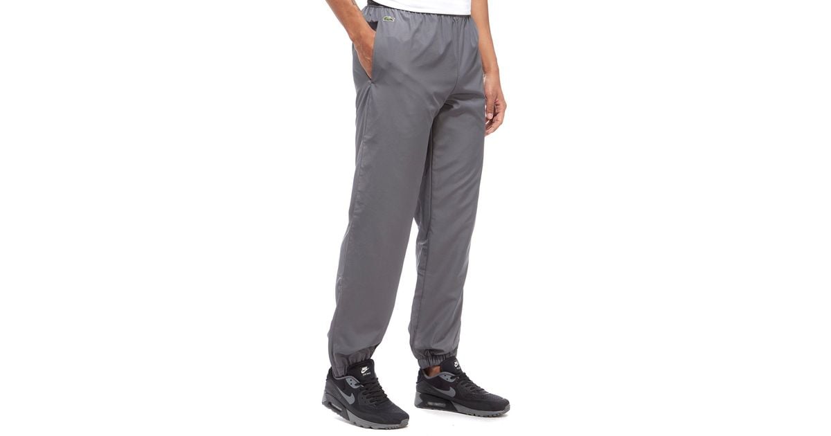 lacoste guppy track pants grey
