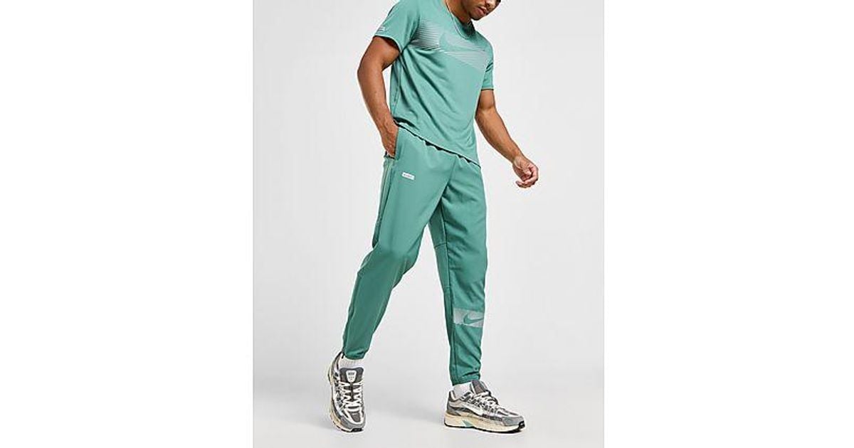 Nike sportswear flash track pant new arrivals