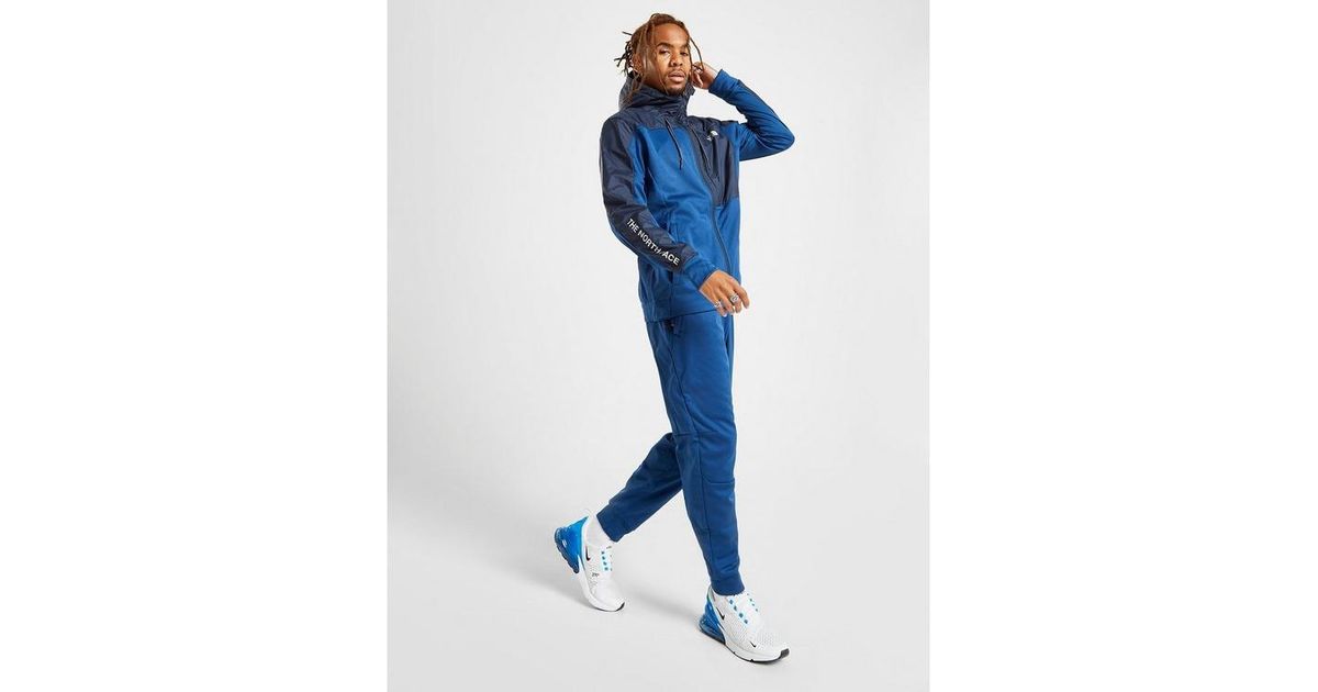 the north face train n logo track pants white