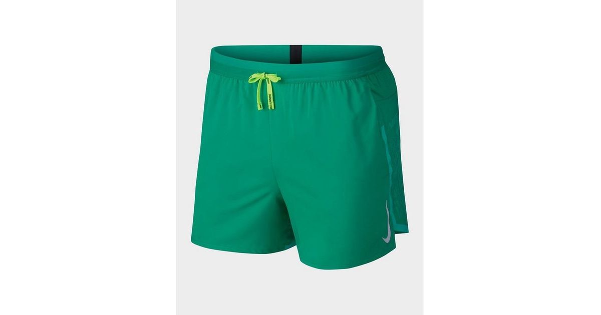 nike flex stride green