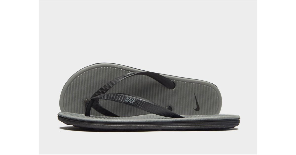 nike solarsoft slippers