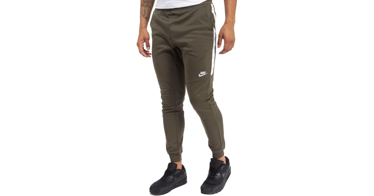 nike tribute track pants