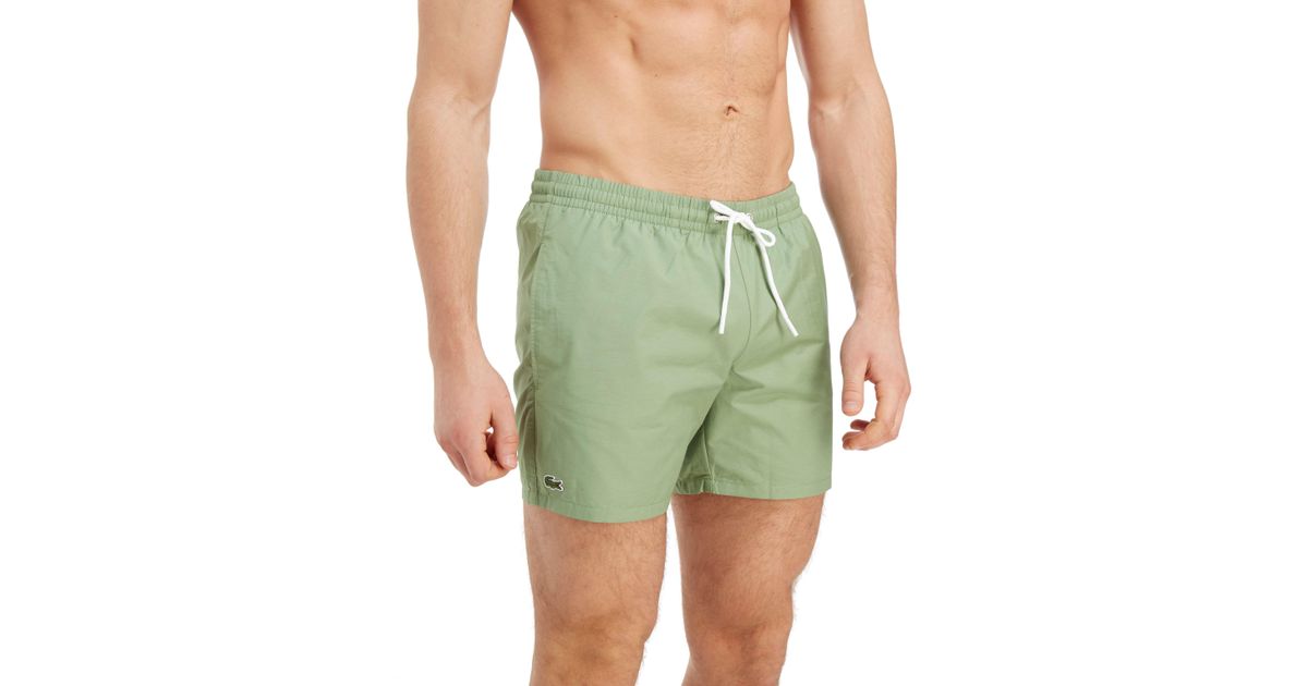 green lacoste swim shorts