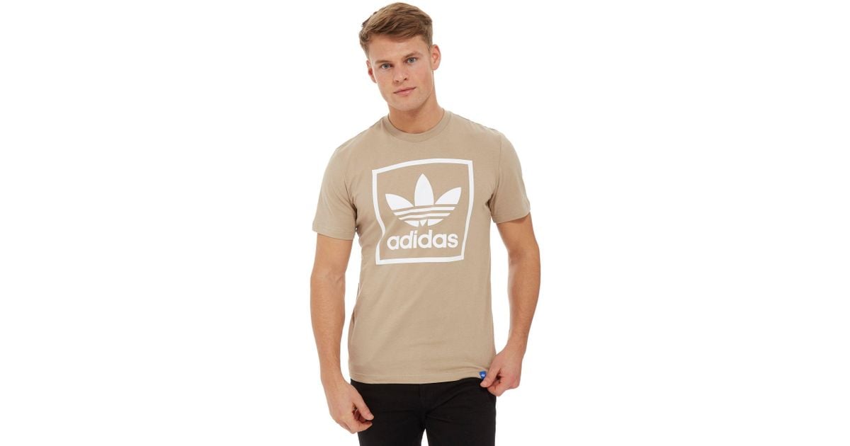 tan adidas shirt
