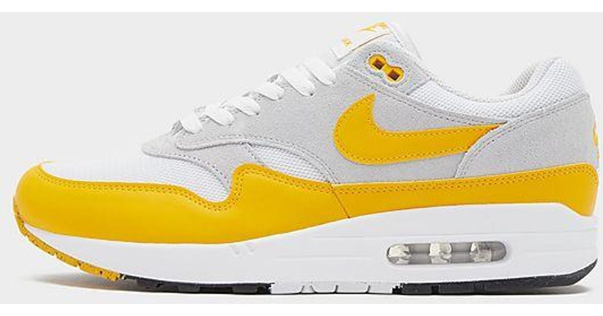 Black and yellow air max 1 sales